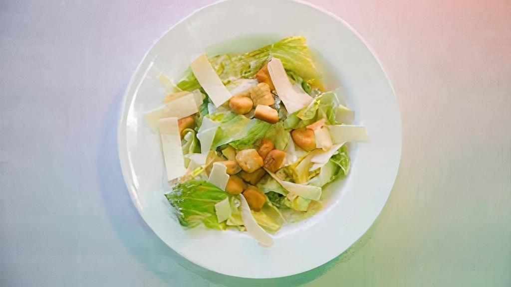 Caesar Salad · Romaine lettuce, topped with croutons and shredded Parmesan cheese.