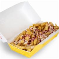 Original Ranch Fries · Savory crinkle cut fries topped with eegee's famous Ranch Dressing and bacon bits