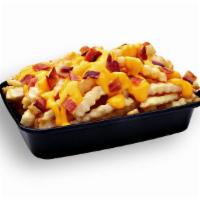 Cheesy Bacon Fries · Warm crinkle cut fries drizzled with cheesy nacho sauce and topped salty bacon bits.