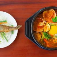 Seafood Soon Tofu Stew / 해물 순두부 · Shrimp, squid, clam and veggies. Served spicy. Comes with rice and side dish. Please contact...
