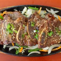 Galbi / 갈비 · Marinated beef short ribs. Served with rice and side dish. Please contact the merchant for s...