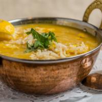 Mulligatawany Soup · Traditional Indian soup made with chicken, lentils and spices.