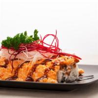 Baked Scallop · Baked scallop with crab salad in house spicy sauce over California roll, drizzled with unagi...