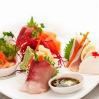 Sashimi Omakase (Large) · Chef’s choice of fish (18 pieces). Served with agedashi tofu, edamame, miso soup, and white ...