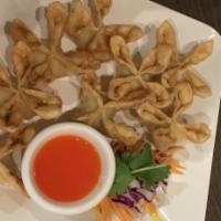 Crab Puff · Wonton wrapping filled with cream cheese and imitation crab meat.