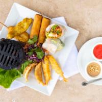 Tottie'S Small Plate Combo · Fresh spring roll, chicken dumpling, tempura shrimp, and chicken satay (2 each). Served with...