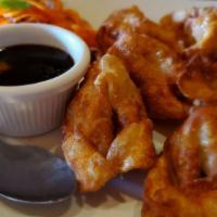 Fried Wonton (6 Pieces) · Deep-fried stuffed chicken wontons. Served with ponzo sauce