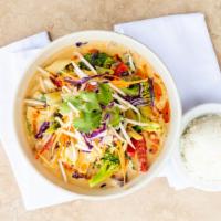Panang · Thai red curry with mushrooms, bamboo shoots, red bell peppers, zucchini, onion, and Thai ba...