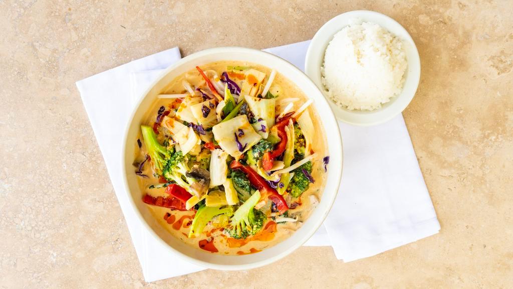 Chiang Mai Noodles · Spicy Thai red curry with chicken, rice noodles,, mushrooms, bamboo shoots, red bell peppers, zucchini, onions, and Thai basil.