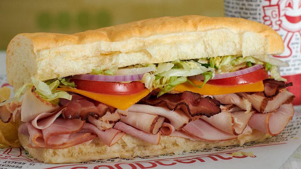 Ultimate Club · Freshly-sliced ham, turkey, and crispy bacon. Now served with 30% more freshly-sliced meat!