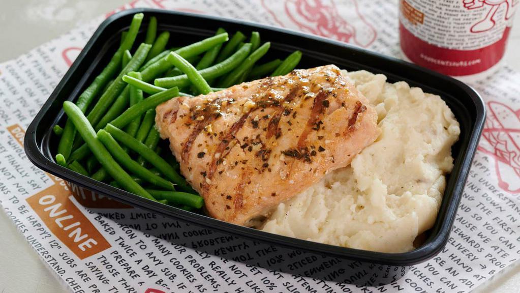 Grilled Alaskan Salmon · ALL Goodcents To Go meals include a 50 cent donation to a local charity. Grilled Alaskan salmon served on buttery mashed Yukon potatoes with steamed green beans (must reheat to eat, not customizable).