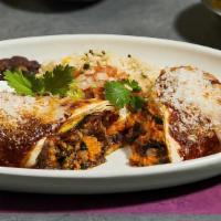 Caramelized Sweet Potato Burrito · grilled portobello, kale, zucchini, manchego cheese, ancho chile sauce