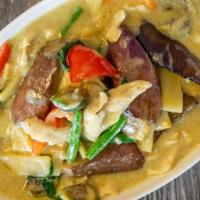 Green Curry · Gluten free. Thai eggplant, bamboo shoot, green bean, bell pepper, and basil in coconut milk...