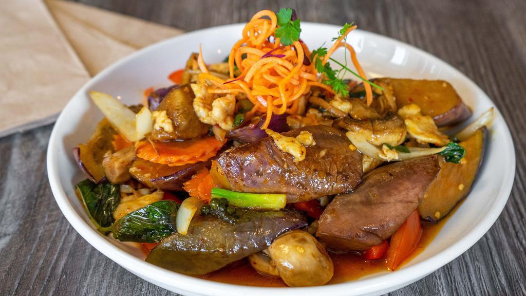 Pad Ped Ma-Khea · Gluten free. Eggplant, mushroom, bell pepper, carrot, onion, basil, peppercorn, and garlic. Served with jasmine rice or brown rice.