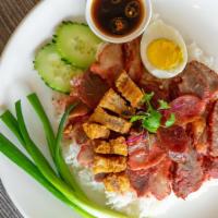 Koa Moo Dang · Thai street food. The tenderness of the barbecue pork with a hint of spice in every bite, th...