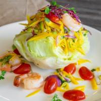 Mango Salad · gluten free. Mango, prawns, cilantro and green onion in our tangy sweet roasted chili dressi...