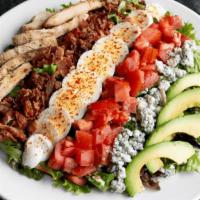 Cobb Salad · 12-16 SERVINGS. Fajita chicken, avocado, bacon, hard-boiled eggs, tomatoes & crumbled bleu c...