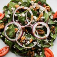 Spinach Salad · 12-16 SERVINGS. Spinach, tomatoes, red onions, candied walnuts, dried cranberries & bleu che...