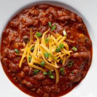 Chicken Chili · Made from scratch & garnished with scallions & cheddar. (cal 360)