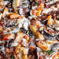 Flathead · Alfredo sauce, fajita chicken, smoky bacon, spinach, tomatoes, mushrooms & mozzarella. (cal ...