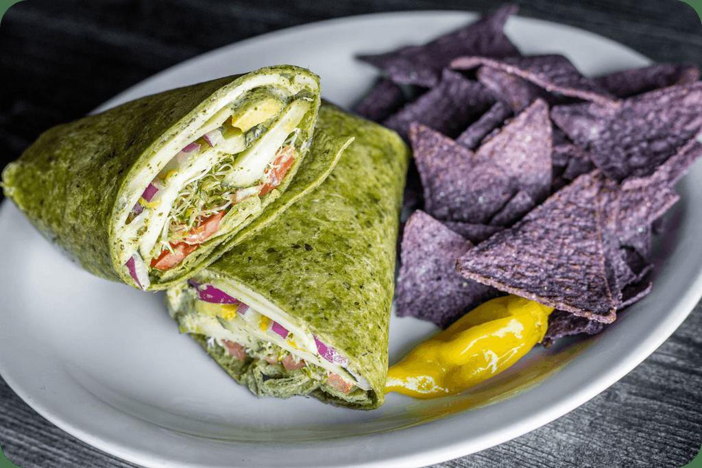 Green Horn Veggie Wrap · Avocado, tomatoes, cucumbers, sprouts, red onions, provolone & pesto mayo in a spinach wrap. Served with blue tortilla chips. (cal 1140)
