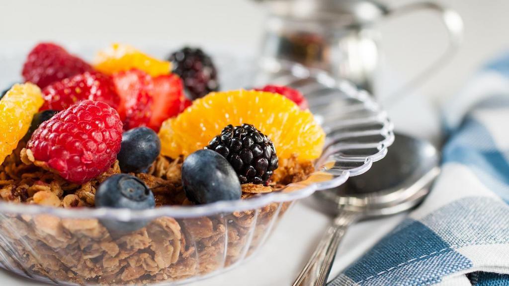 G & P Granola · (604 cal, 33gm fat, 75 carbs, 11gm protein) Rolled oats, oat bran, flax seeds, pecans, walnuts, coconut, raisins, maple syrup, cinnamon, nutmeg, & sucanat withberries on top.