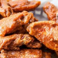 Original Wings (25 Pcs.) · Original or boneless chicken wings served with your choice of sauce, celery, carrots, and ra...