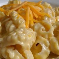 Kids Mac & Cheese · Fresh pasta, cheddar cheese sauce, choice of side