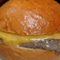 Kids Cheeseburger · Quarter-pound grass-fed beef patty, cheddar, housemade bun, choice of side