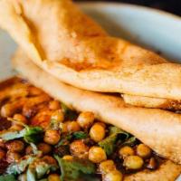 Hummus Plate, Crispy Chickpea Crêpe Chips · Vegan. Chickpea puree, fried chickpeas, and pistachio herb olive oil.
