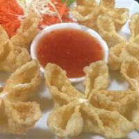 Golden Rangoon · Minced crab meat with cream cheese filling inside wonton wrappers, fried until golden brown....
