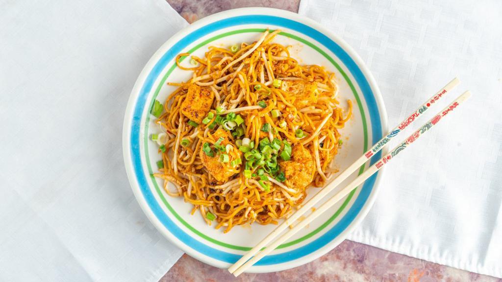 Indian Mee Goreng · Indian style stir-fried egg noodles in light and dark soya sauce with your choice of protein, eggs, bean sprouts, and chili paste.