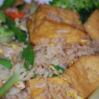 Veggie Fried Rice · White jasmine rice stir-fried with eggs, fried tofu, cabbage, carrots, snow peas, broccoli, ...