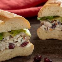 Pecancran Chicken Salad · Chicken salad, cranberry, pecans &  lettuce served on your choice of lettuce greens or
toast...