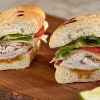 Turkey Swiss · Sliced all natural roasted turkey breast, Swiss cheese, lettuce & tomato & Honeycup mustard ...