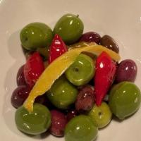 Marinated Olives · calabrian chili, citrus, coriander, olive oil