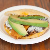 Pabellón Arepa (Chicken) · Shredded beef, fried plantain, black beans, avocado, and grated white cotija cheese.