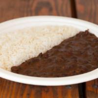 Arroz Con Caraotas · White rice and black beans.