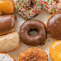 Regular Donuts (1 Dozen) · Regular Donuts include
Cake, Devils Food, Old Fashion, Bars, Twists, Jellies, French Cruller...