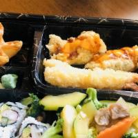 Shrimp Bento · Teriyaki shrimp, four pc California roll and sauteed veggies.