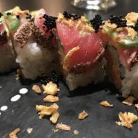 Pepper Tuna (8) · Seared ahi tuna sashimi with black pepper on a bed of julienne cucumber served with ponzu sa...