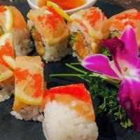 Salmon Lover · Spicy salmon, cucumber, daikon sprout, top with fresh salmon, thinly sliced lemon, red tobik...