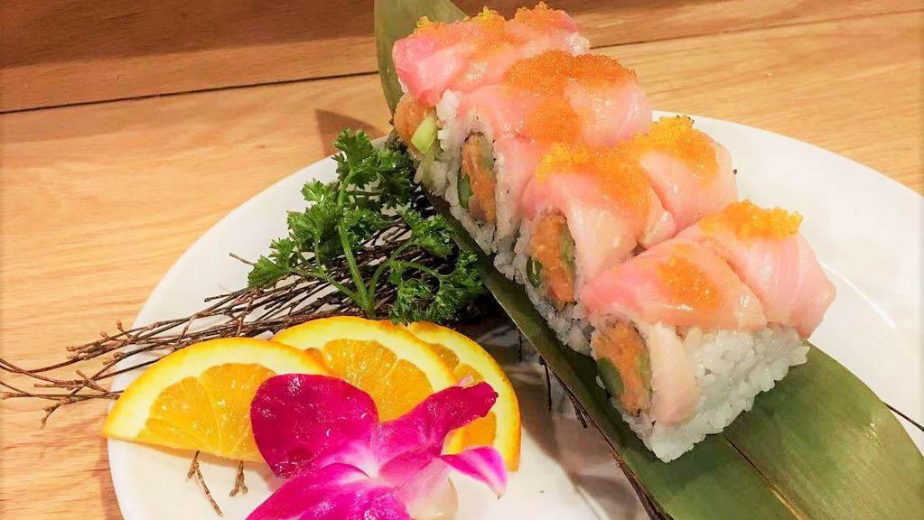 Yellowtail Lover · Spicy yellowtail, cucumber, asparagus, fresh yellowtail on top, green onion,yuzu tobiko served with yuzu sauce on the side.
