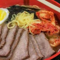Eeny Meeny Beef Ramen Soup · Japanese ramen noodle in house broth, with broiled beef, seed weed, kimchi (korean style sal...