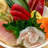 Chirashi · Chef choice of assorted sahshimi over sushi rice (12pc).