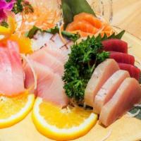 Sashimi Deluxe · Chef choice of 18pcs assorted sashimi.