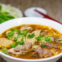 Spicy Sour Beef Noodle Soups / Bún Bò Huế · Spicy. Beef, pork short rib, ham & vegetables.