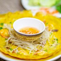 Vietnamese Savory Crispy Crepe / Bánh Xèo · Seasoned rice flour with coconut milk, egg, pork, shrimp & vegetables. Raw egg consuming raw...