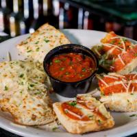 Schmeezy Bread · Prices vary in store. Fresh-baked bread, blasted with cheesy garlic goodness and served with...