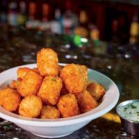 Tater Tots · Crisy Tots served with a side of Marinara.